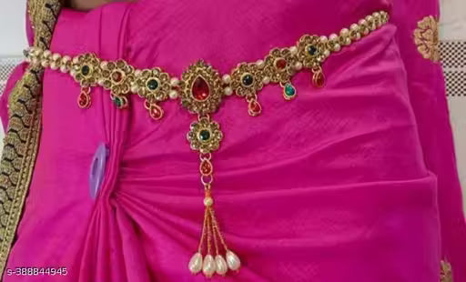 A kamarband is a traditional waist accessory that combines elegance